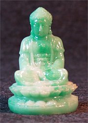 Contemporary figure of green jade-like glass (2.5 in. tall