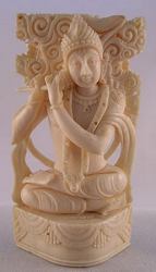 Ivory carving of the Indian deity Krishna, eighth avatar or reincarnation of the god Vishnu, the major god of Hinduism.  Krishna, the great lover, is also one of the most popular Hindu gods, often pictured playing his flute - museum quality (3.5 in tall)