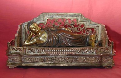 Reclining Buddha (a.k.a The Golden Lion) on intricate bed - masterfully cast in Bronze and gilt (12 in. long) - Qing Dynasty